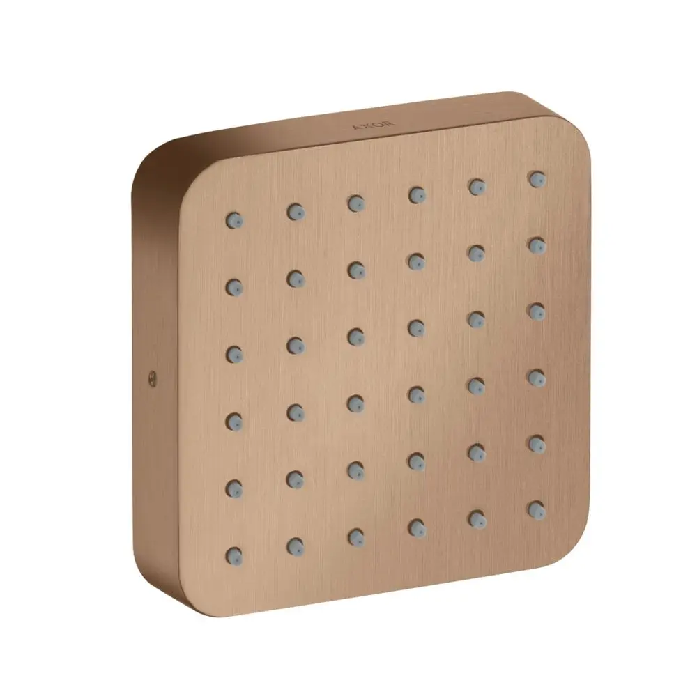 Brausemodul in rechteckiger Form mit vielen kleinen Düsen, Oberfläche in gebürstetem Rotgold, Marke AXOR, geeignet für Unterputzinstallation.